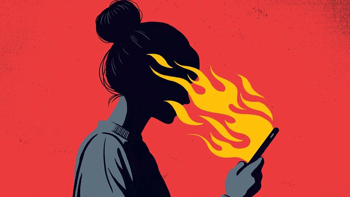 A digital illustration of a person with their face engulfed in flames as they look at a smartphone. The background is red, symbolizing intensity, anger, or digital toxicity. The person appears to be consumed by the fire, representing the effects of online hate, cyberbullying, or digital addiction.