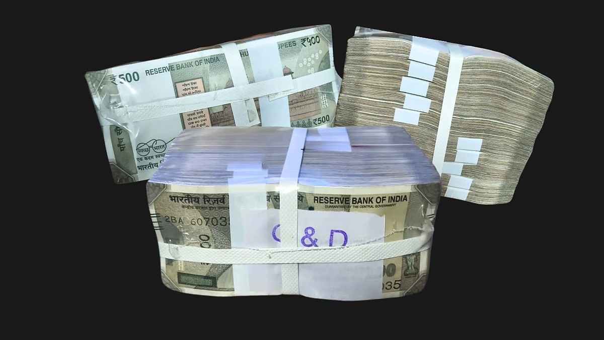 "Bundles of Indian currency notes, primarily ₹500 denomination, stacked and wrapped with white straps. The notes appear neatly arranged, with some featuring labels or markings. The background is black, making the money bundles stand out prominently."